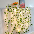 Guirnalda de luces para decoración del hogar, guirnalda de luces con batería para árbol de Navidad, vid Artificial, hojas verdes y flores